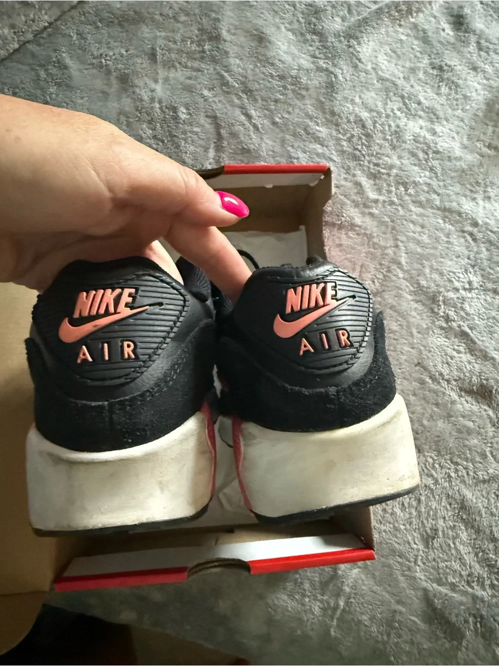 Nike Kids Black Sneakers with Pink and Purple Accents and White Swoosh